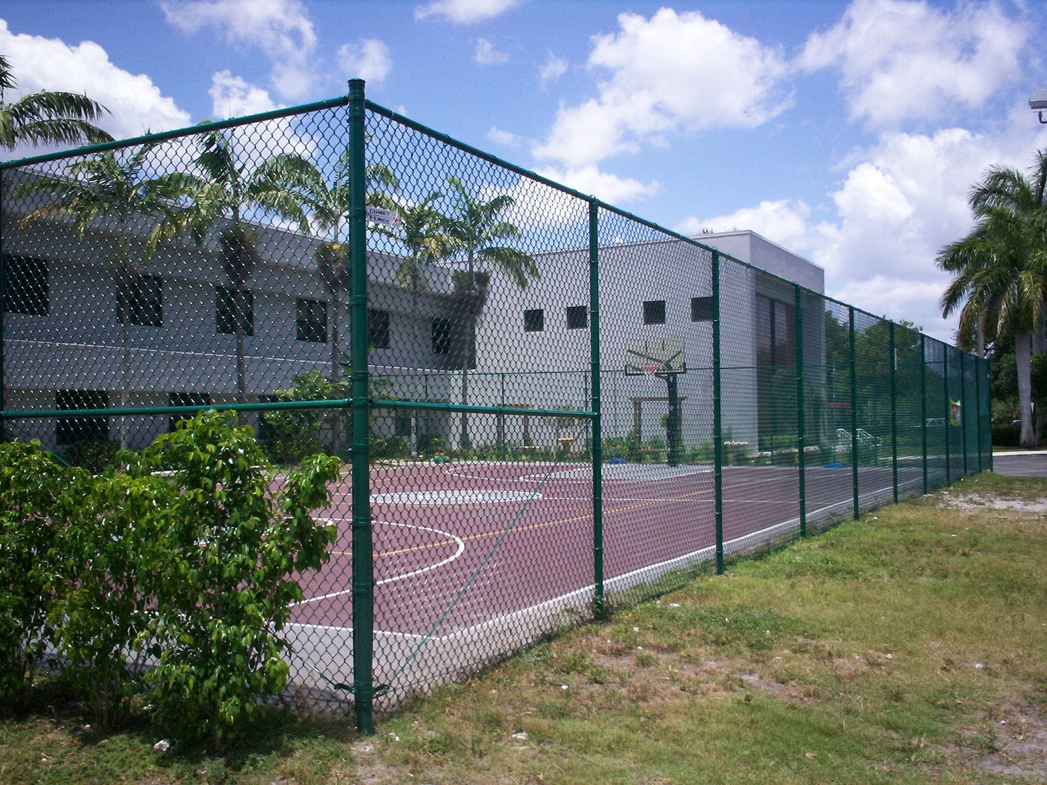 Tall outfield and backstop netting at baseball and softball diamonds